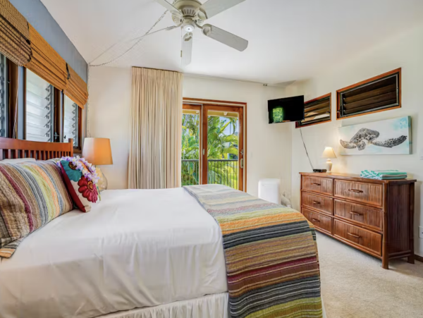 Luxury Poipu Kauai Vacation Rental  Ocean View Top-Floor Condo Near Brennecke’s Beach